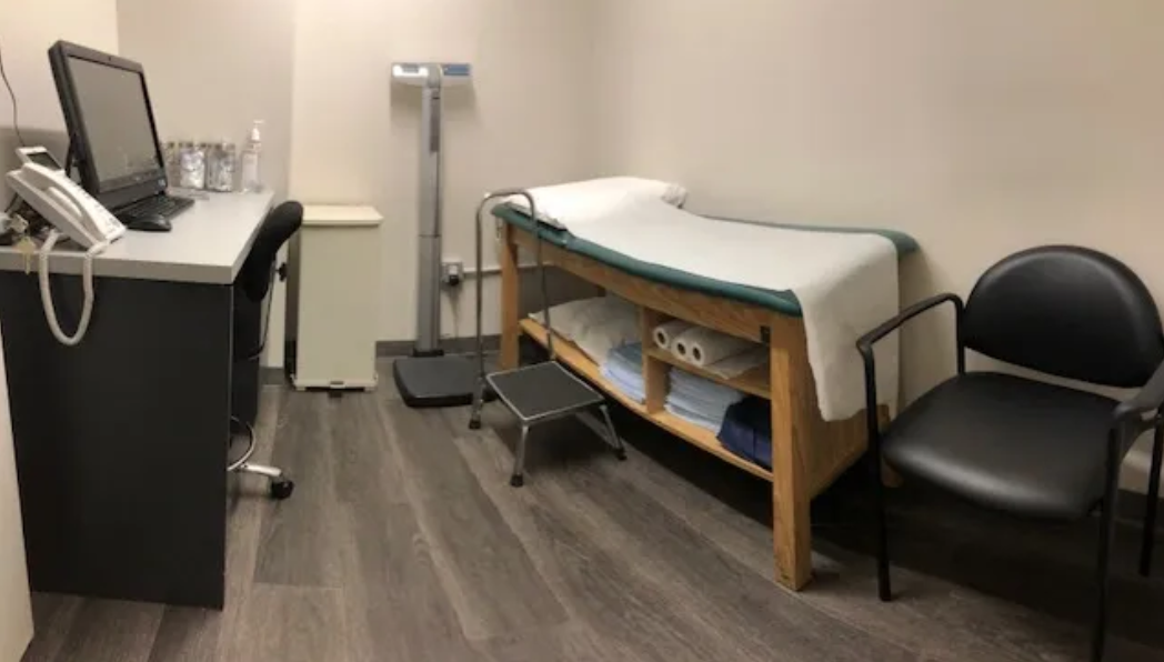 Medical examination room with treatment table